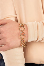 Load image into Gallery viewer, Paparazzi The Universe Revolves Around Me - Gold Bracelet