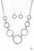 Load image into Gallery viewer, Paparazzi VINTAGE VAULT "City Circus" Silver Necklace &amp; Earring Set Paparazzi Jewelry
