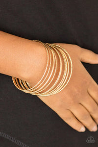 Paparazzi Bangle Babe - Gold Bracelet