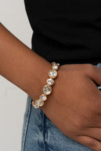 Load image into Gallery viewer, Paparazzi Still GLOWING Strong - Gold Bracelet
