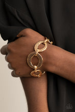 Load image into Gallery viewer, Paparazzi STEEL The Show - Gold Bracelet
