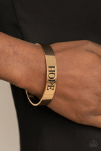Load image into Gallery viewer, Paparazzi Hope Makes The World Go Round - Gold Bracelet
