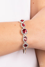 Load image into Gallery viewer, Paparazzi Simmer on GLOW - Red Bracelet
